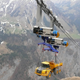 Illustration for article titled Truck transported on a ropeway going up a 5,400-foot mountain